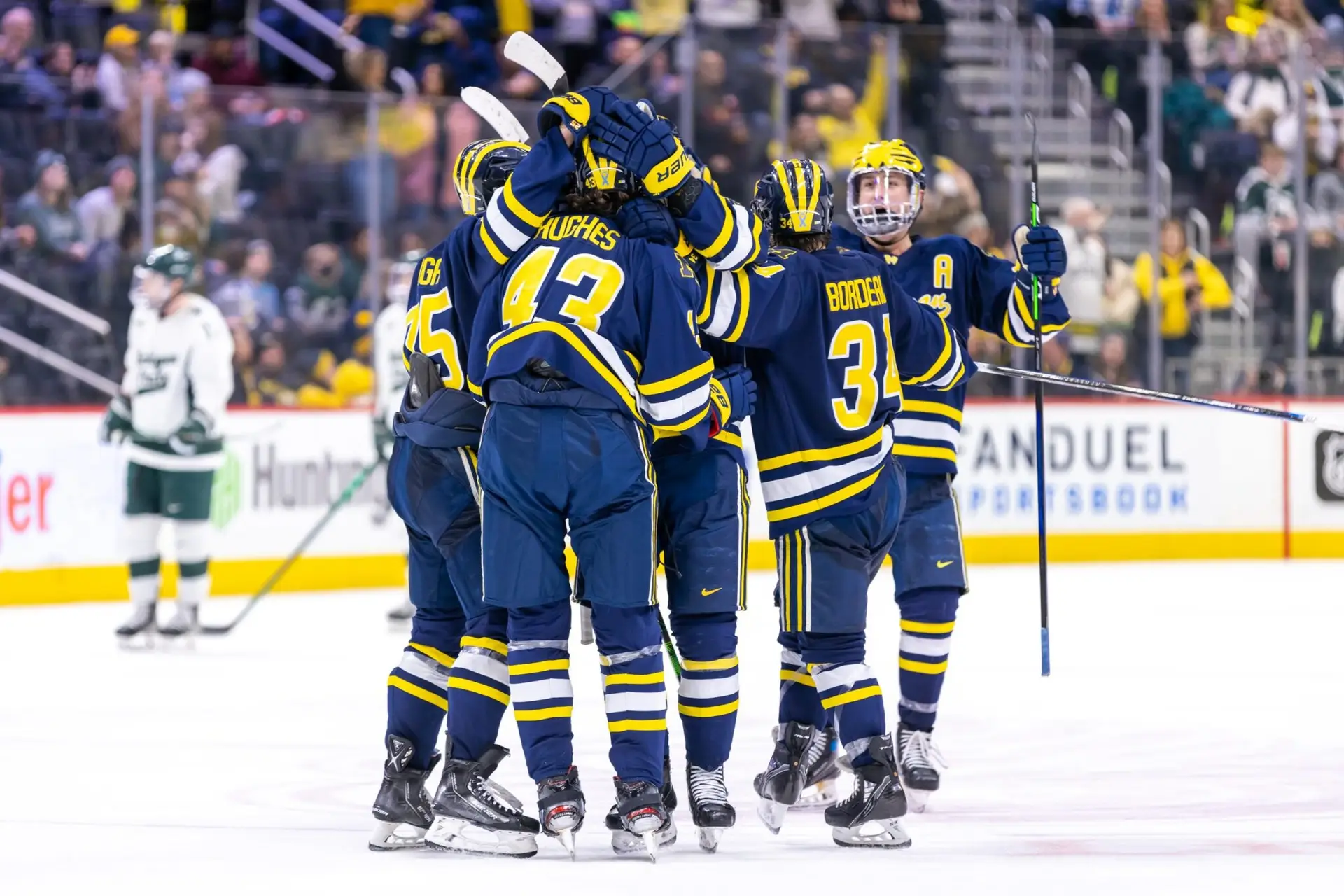 Duel in the D Michigan vs Michigan State Hockey, photographed by C2 Visual Media